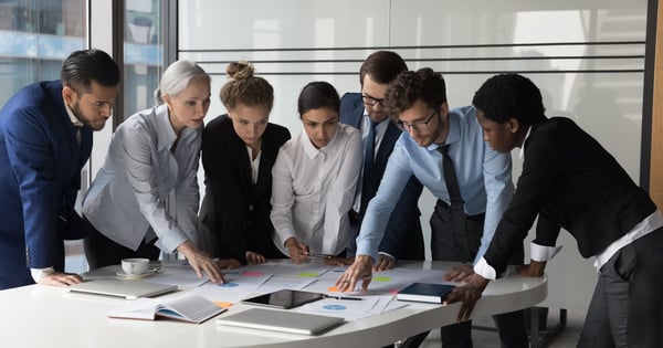 Diverse group of people collaborating at work